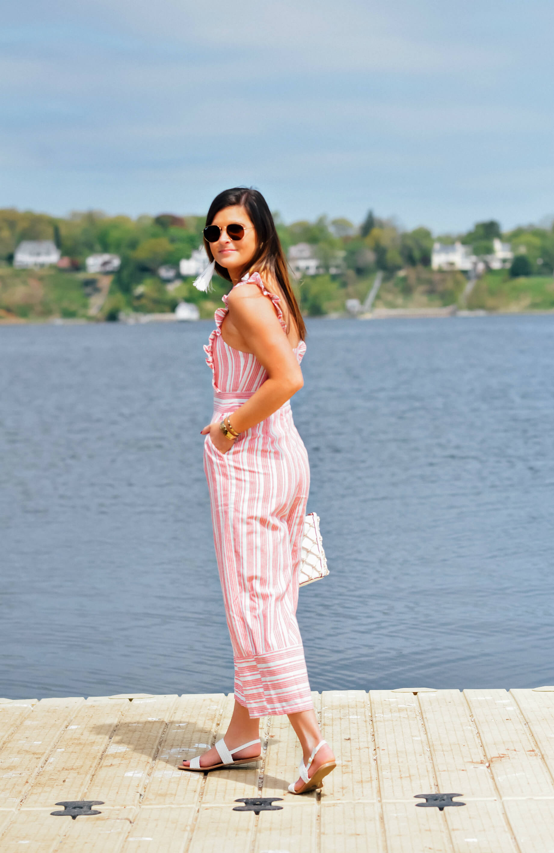 LULUS EMILIA RAE WHITE AND RED STRIPED RUFFLE CULOTTE JUMPSUIT, LULUS BLAISE WHITE FLAT SANDALS, LULUS MELLOW MOOD WHITE NET TOTE, LULUS STAY RAD WHITE WOVEN RATTAN TASSEL EARRINGS, Memorial Day Outfit Idea, Memorial Day Style, Tilden of To Be Bright